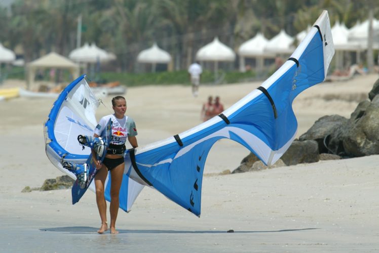 Women Kitesurfer athlete during sport event the Red-Bull King Of Air in Dubai