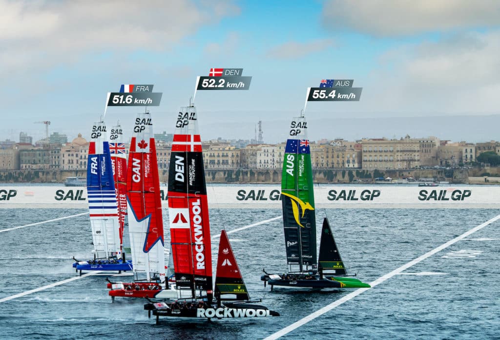 High-quality action shot of SailGP race, showcasing the speed and intensity of sailing competition.