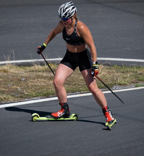 Sportswomen on action Roller Cross Country Skating